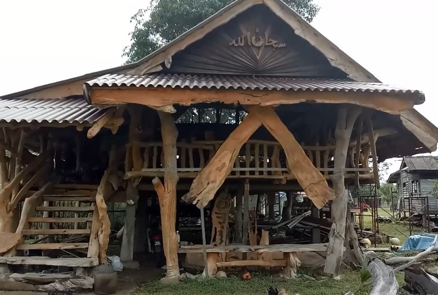 Ngoi nha cay doc dao cua nha tho Malaysia hinh anh