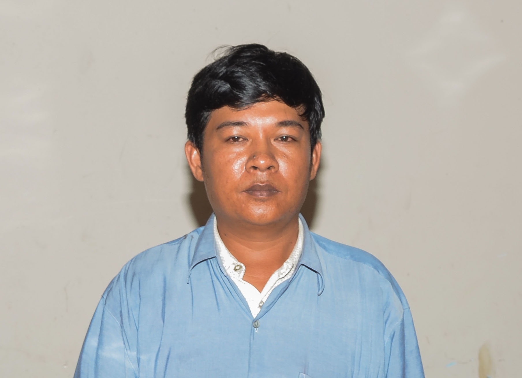 Nghi phạm bị tạm giữ. Ảnh Nguyễn Đức Thắng.