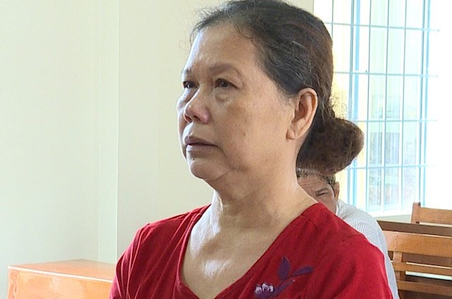 Nguoi dan ba tat axit lam mu mat nhan tinh bi tang an hinh anh