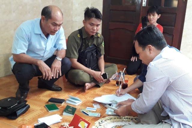 Tra lai 5.000 USD anh 1