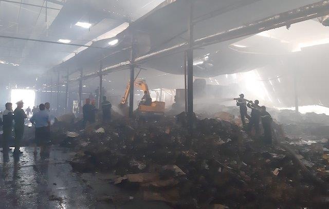 Chay nha may giay Tien Giang anh 2