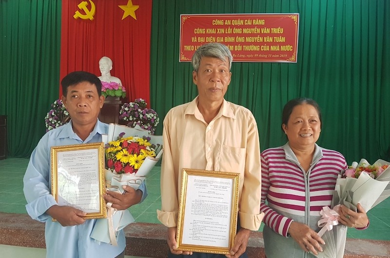 Cong an xin loi 2 cong dan bi oan sai hinh anh