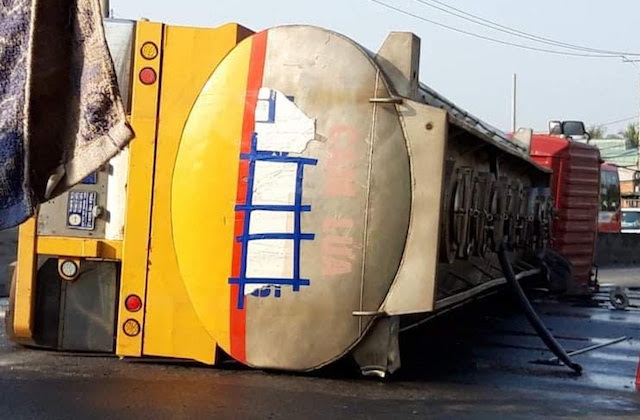 Lat xe bon cho hoa chat, quoc lo 1 un tac 10 km hinh anh