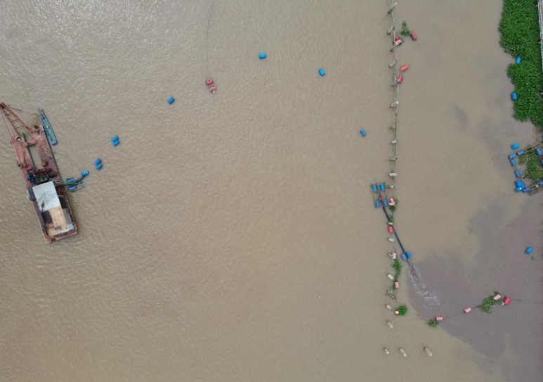 Doanh nghiep khai thac trai phep 1.000 m3 khoang san hinh anh