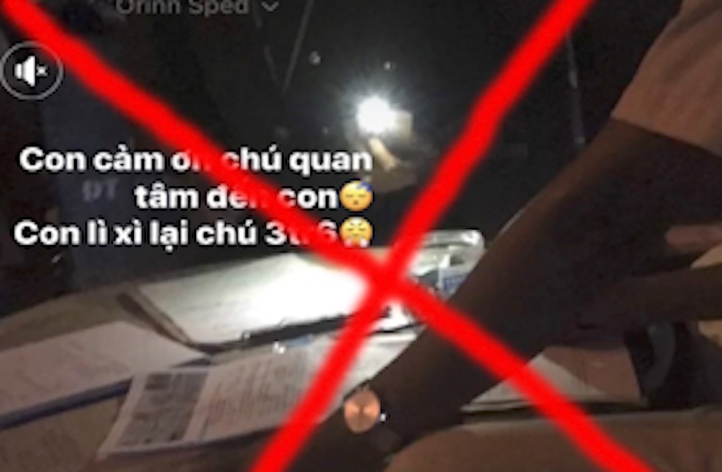 Vi pham giao thong roi bia chuyen li xi 3,6 trieu dong cho canh sat hinh anh