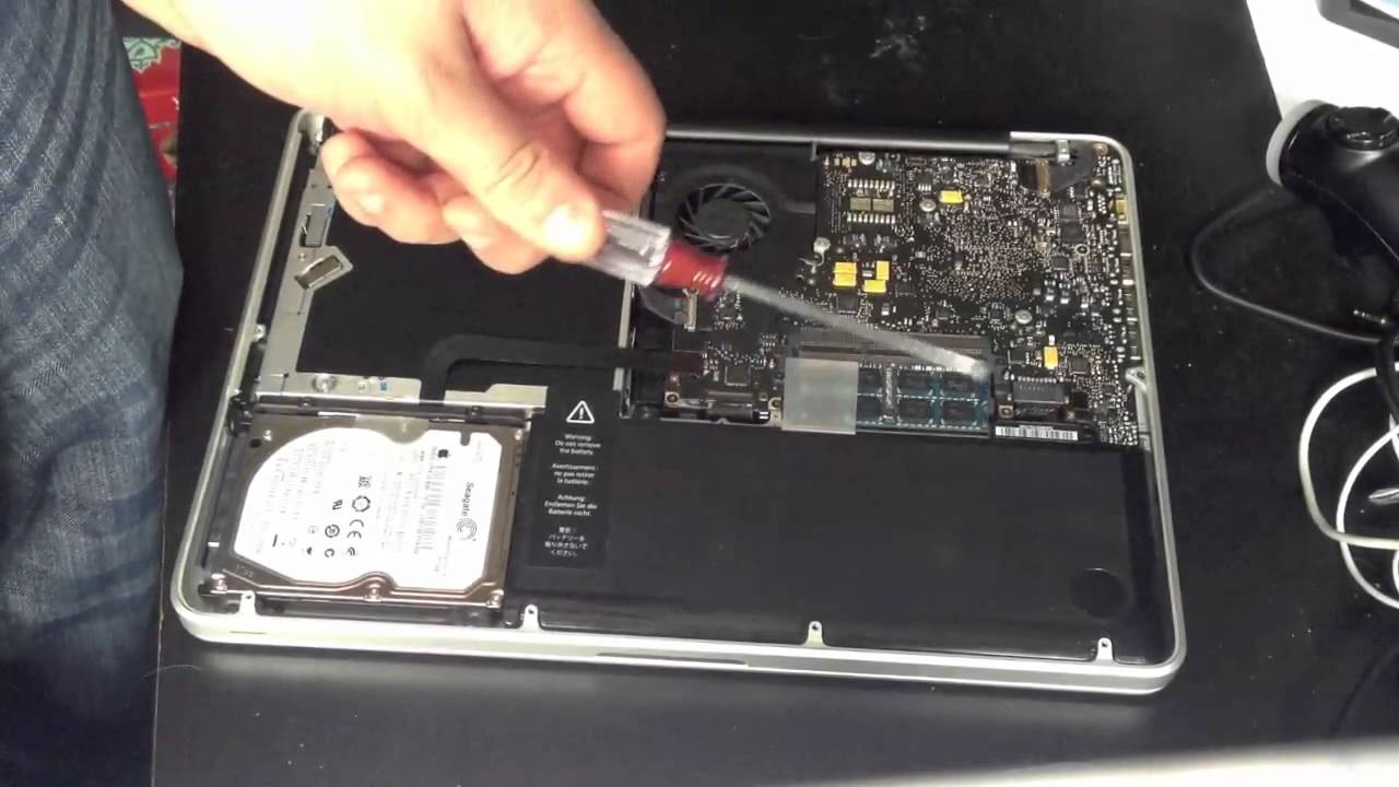 Apple thay pin mien phi cho MacBook Pro anh 1