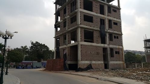 Nguoi dan ong chet trong be nuoc ngoi nha dang xay hinh anh