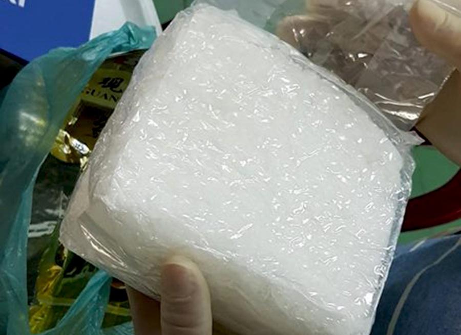 Doi nam nu lai oto di mua 1, 5 kg ma tuy da ve tieu thu anh 1