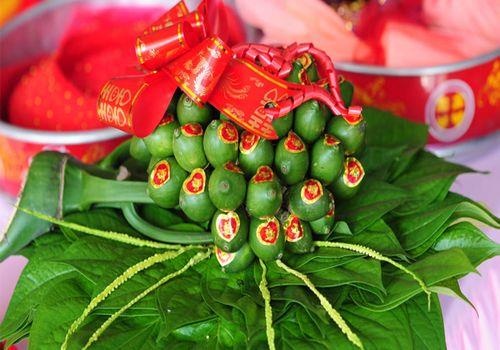 Tai sao le cuoi cua nguoi Viet khong the thieu trau cau? hinh anh