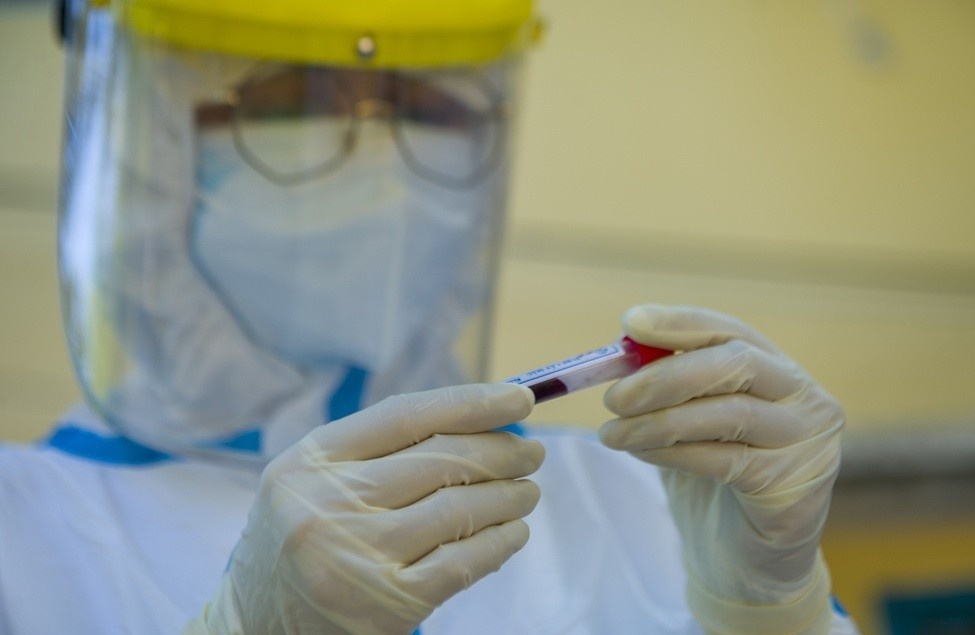 Mot nguoi mac Covid-19 sau khi tro ve tu Nhat Ban hinh anh