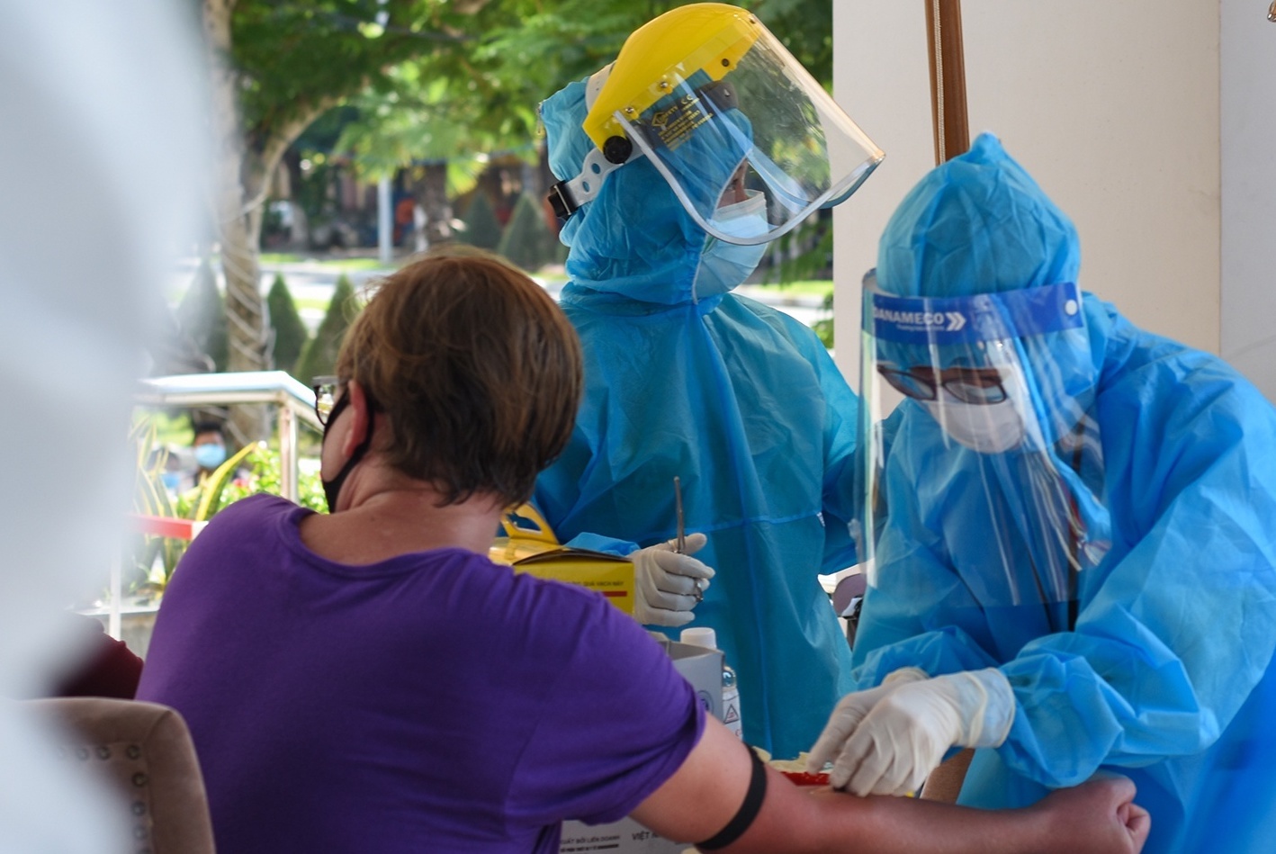 Hai nguoi tro ve tu My nhiem nCoV hinh anh