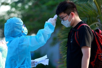 Vi sao nguoi cach ly chi duoc ve nha khi co 2 lan am tinh voi nCoV? hinh anh