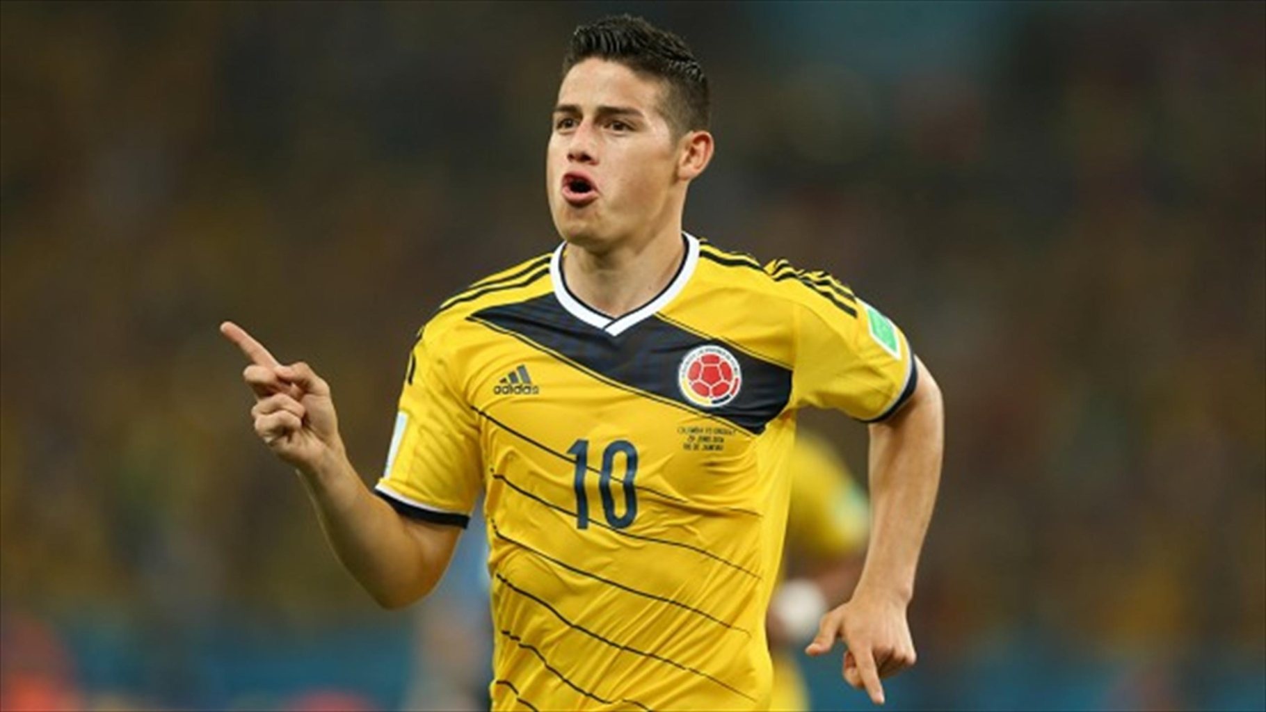 Tiền vệ: James Rodriguez (Colombia): Bản hợp đồng trị giá 63 triệu bảng của Real Madrid có màn ra mắt khá ấn tượng trong mùa giải đầu tiên tại Bernabeu. Ngôi sao 23 tuổi ghi 13 bàn cùng 13 đường kiến tạo sau 29 lần ra sân cho Los Blancos. Chủ nhân danh hiệu “Bàn thắng đẹp nhất World Cup 2014” hứa hẹn làm lu mờ những siêu sao Nam Mỹ khác như Lionel Messi, Neymar.  Ảnh: Eurosport .