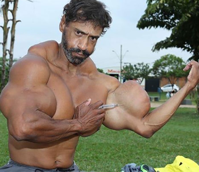 Nguoi dan ong tiem dau vao co bap anh 8