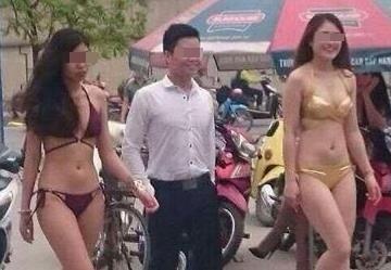 Dan thieu nu mac bikini quang cao dien may gay tranh cai hinh anh