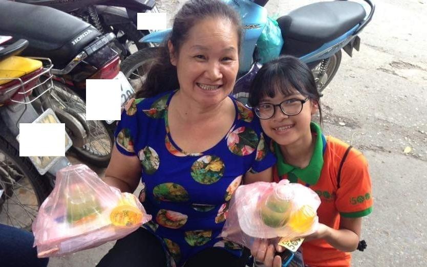 Nu cuoi rang ro den tu nhung phan com 5.000 dong hinh anh