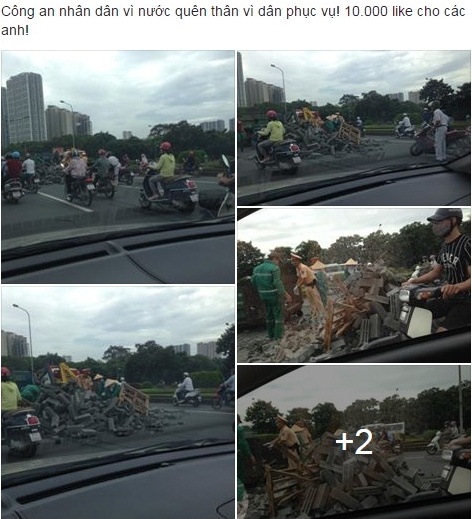 cảnh sát giao thông dọn gạch giữa đường ảnh 1 canh sat giao thong don gach giua duong anh 1