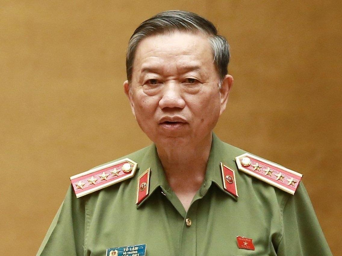 Bo truong To Lam tra loi chat van truoc Quoc hoi hinh anh