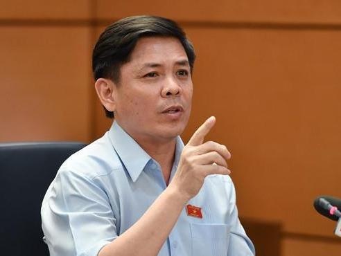 Bo truong Nguyen Van The tra loi chat van truoc Quoc hoi hinh anh