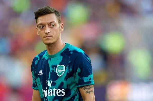 ozil arsenal dc united ảnh 1 ozil arsenal dc united anh 1