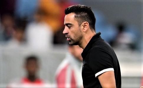 Xavi uc che, da bay giay trong ngay dau lam HLV hinh anh