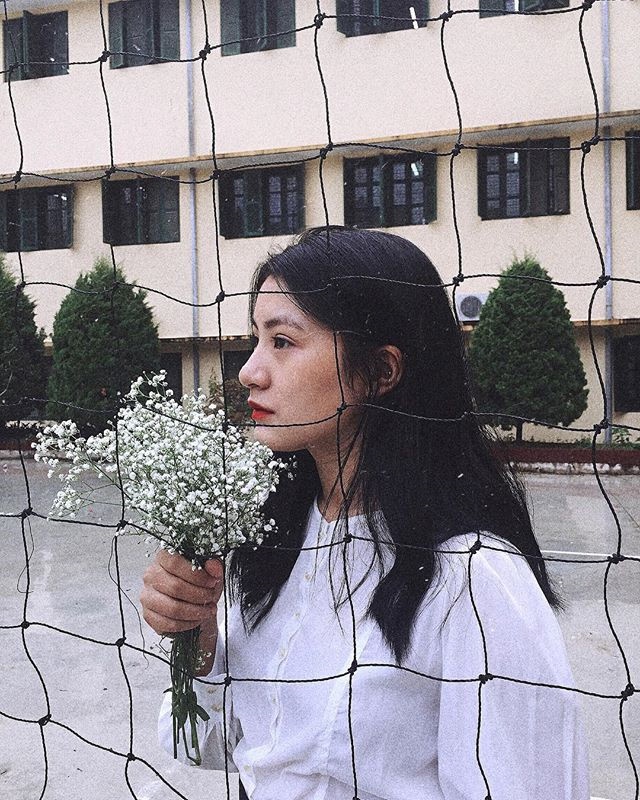 co gai tang hoa ong Kim Jong Un anh 4