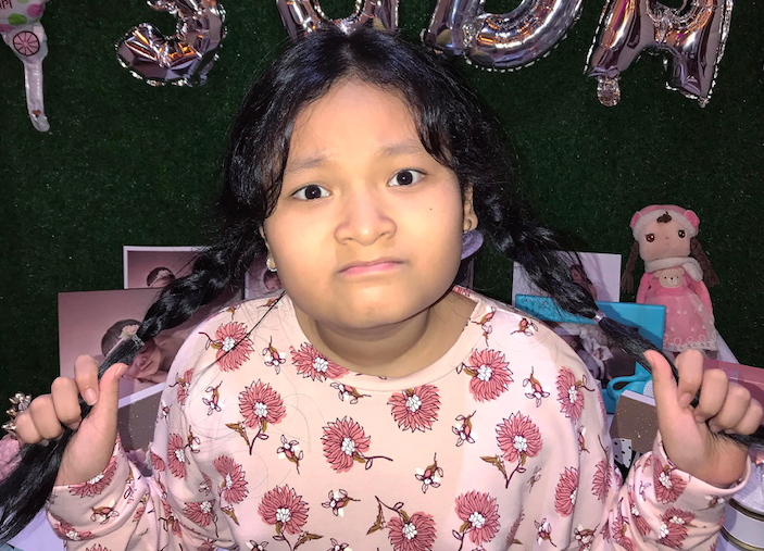 Phien ban nu 12 tuoi cua Vinh Rau hat rap hai huoc hinh anh