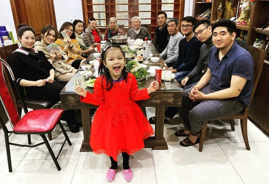 Het Tet, dan mang chia se mam com banh chung, thit kho quen thuoc hinh anh