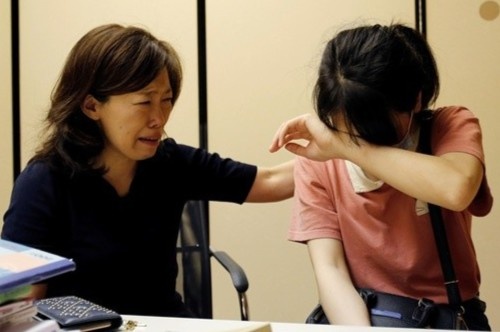 Ngoi chua o Tokyo don lao dong Viet Nam mat viec ta tuc qua mua dich hinh anh