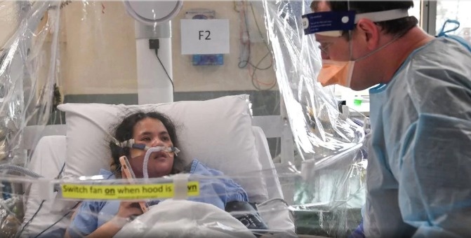 gia dinh nhiem covid-19 anh 1