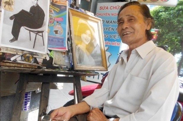 Hoa si ve tranh truyen than luu giu ky niem xua o TP.HCM hinh anh