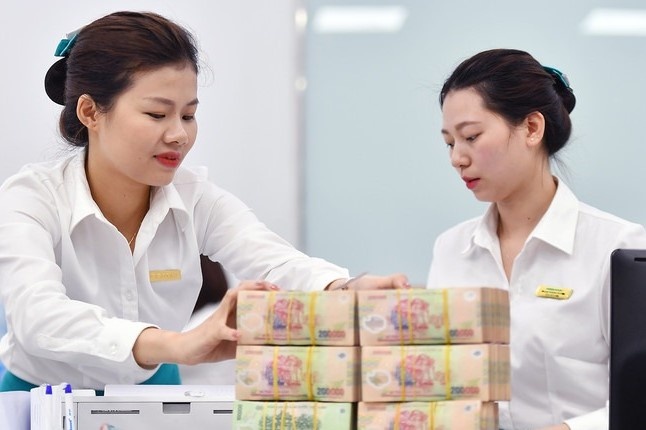 Noi am anh cua nhan vien ngan hang ngay gan Tet hinh anh