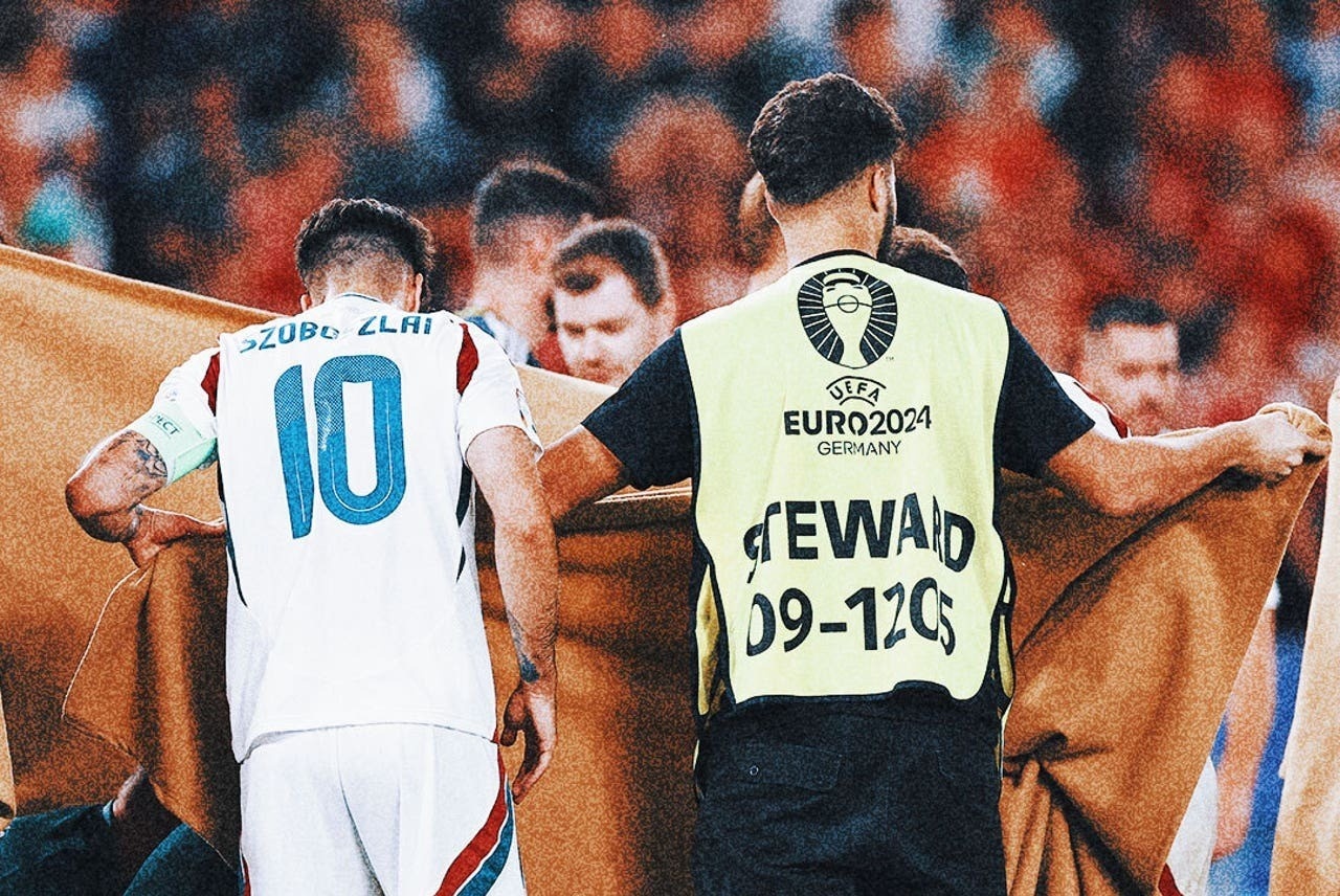 UEFA lai mac loi lon khi cau thu Hungary nga guc giua san hinh anh