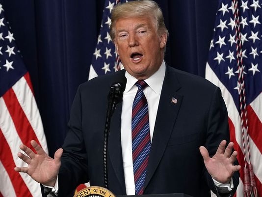 Trump doi thu Kim Jong Un anh 1