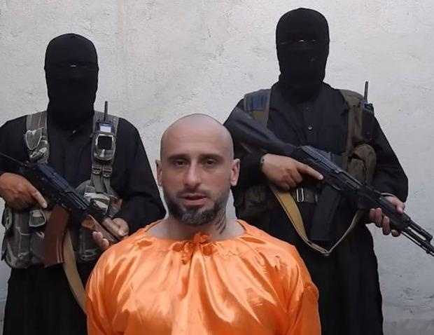 Con tin Nhat, Italy bi khung bo bat coc tai Syria van xin duoc tha hinh anh