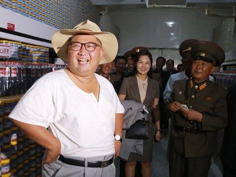 Ong Kim Jong Un va vo tham xuong san xuat ca ngam hinh anh