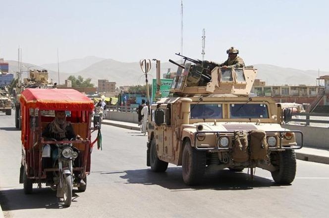 Taliban tai Afghanistan tu choi ngung ban, bat coc them 200 nguoi hinh anh