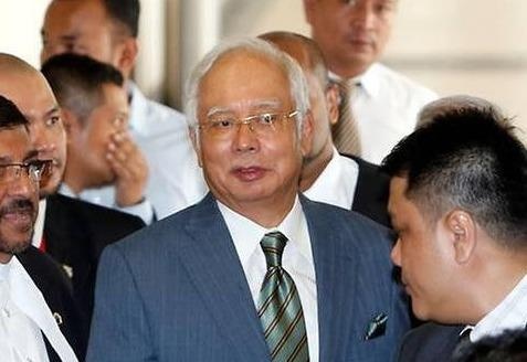 Cuu thu tuong Malaysia Najib doi mat 25 cao buoc tham nhung, rua tien hinh anh