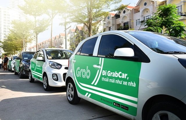 Bat binh, kien tung vi Uber, Grab lua doi ve thu nhap hinh anh