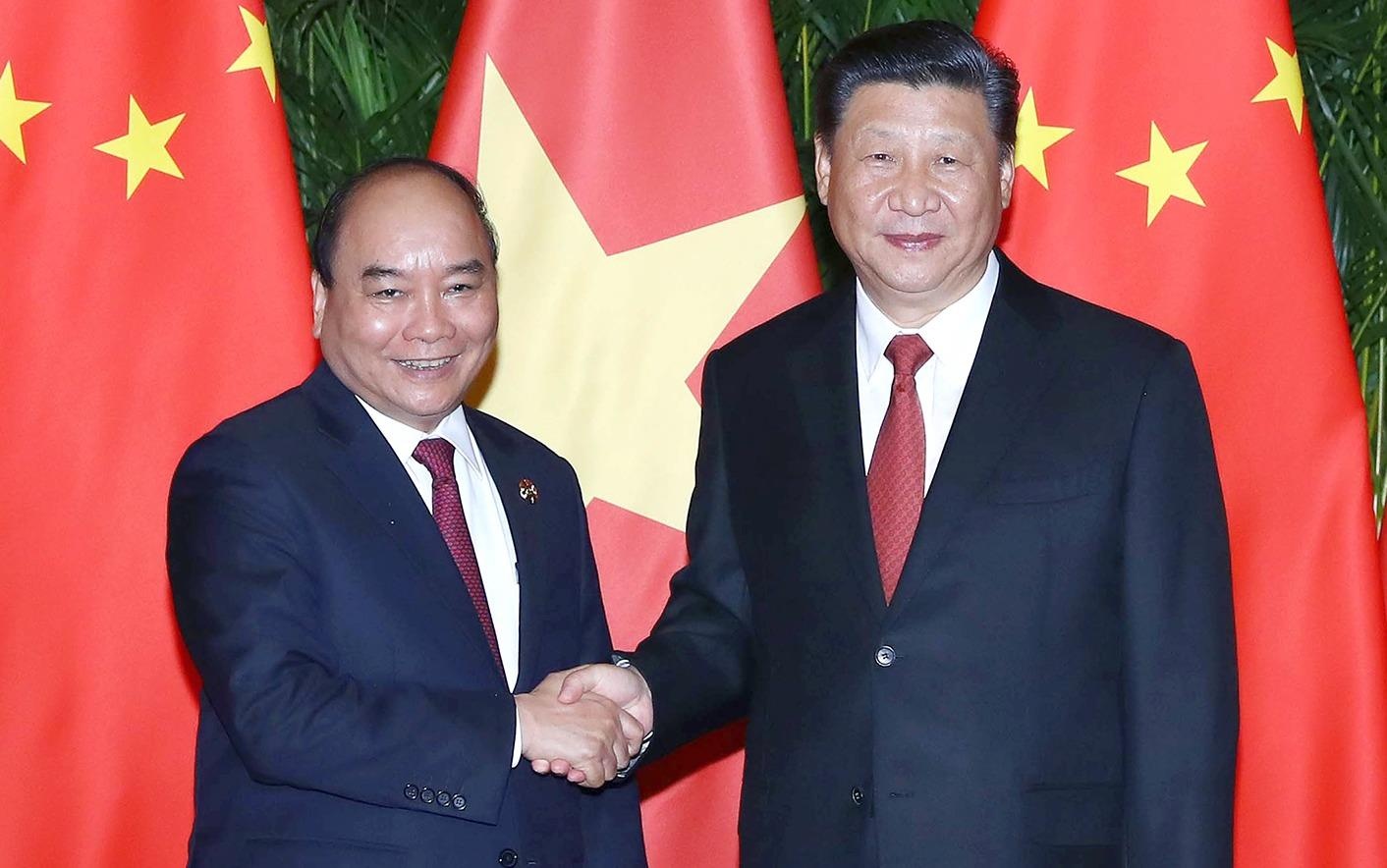 Thu tuong Nguyen Xuan Phuc hoi kien Chu tich Trung Quoc Tap Can Binh hinh anh