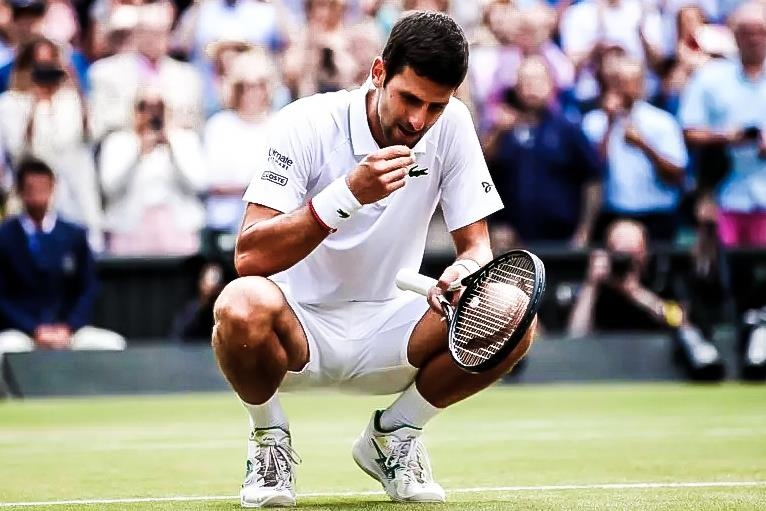 Khoanh khac Djokovic an co o Wimbledon sau khi thang Federer hinh anh
