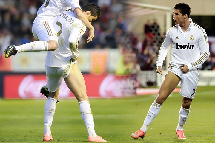 Ronaldo va 2 lan khoe co bap khi an mung hinh anh