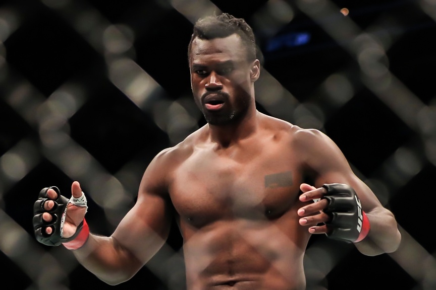 Vo si UFC dau tien gianh chien thang du khong can ra don hinh anh