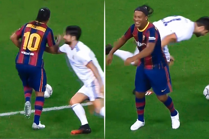 Ronaldinho cuoi tuoi khi bi keo nguoi hinh anh