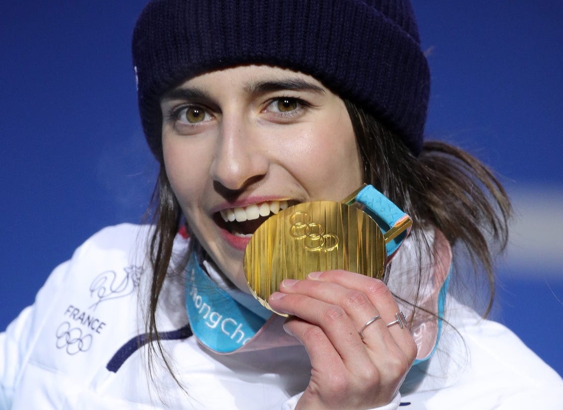 Huy chuong Olympic co duoc lam bang vang that? hinh anh