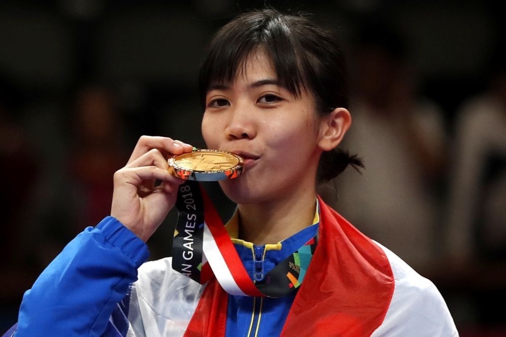 Dang cap cua nha vo dich Olympic nguoi Thai Lan hinh anh