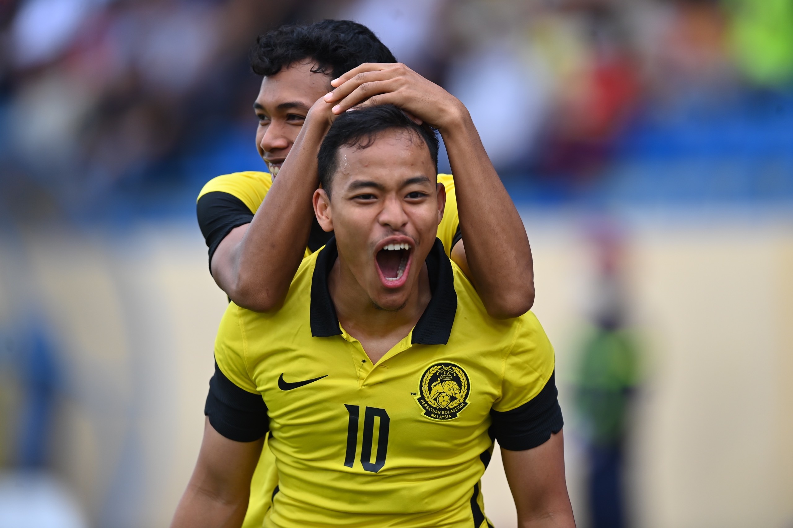 U23 Viet Nam phai de chung Luqman Hakim anh 1