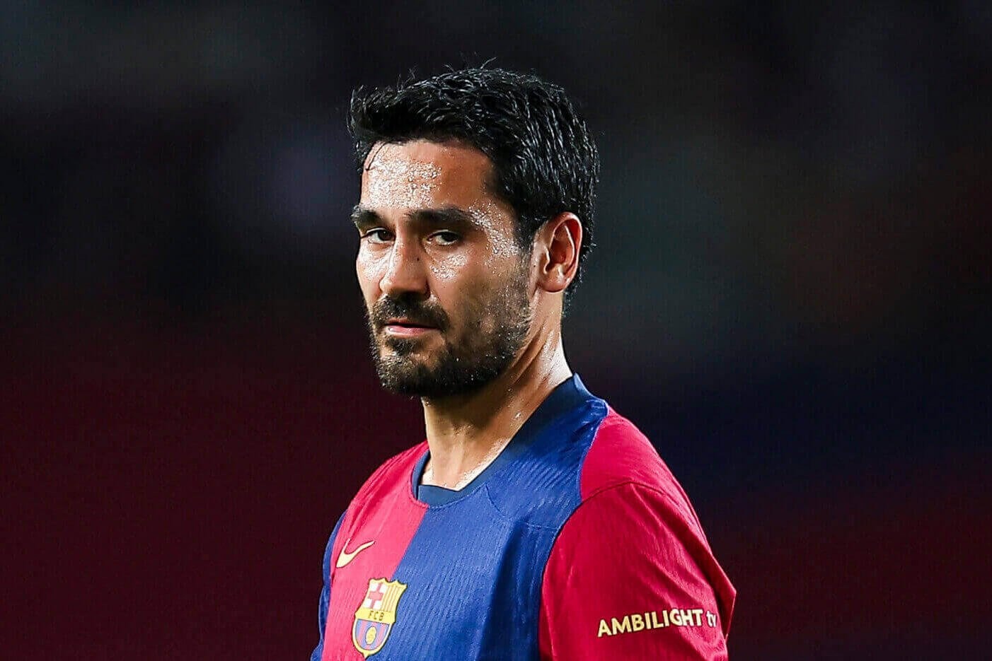 Ly do Gundogan phai khan goi roi Barcelona hinh anh