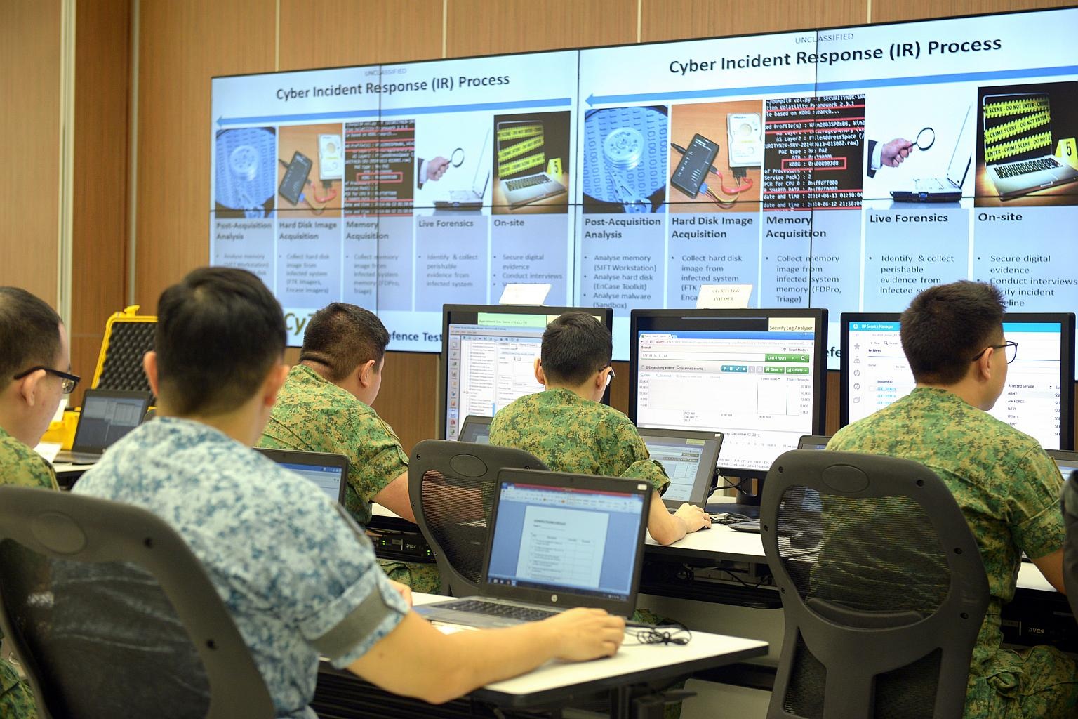 Singapore moi hacker 'thu' he thong Internet quoc phong hinh anh