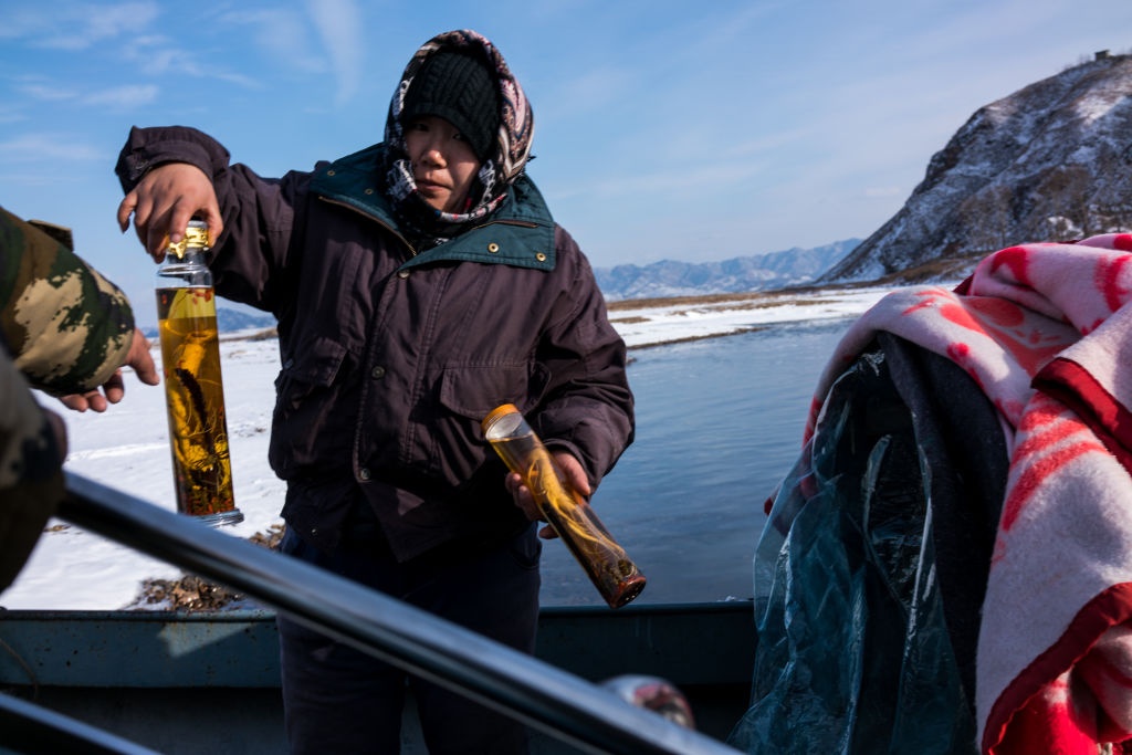 Nguoi Trieu Tien o TQ chenh venh truoc lenh cam kinh doanh hinh anh